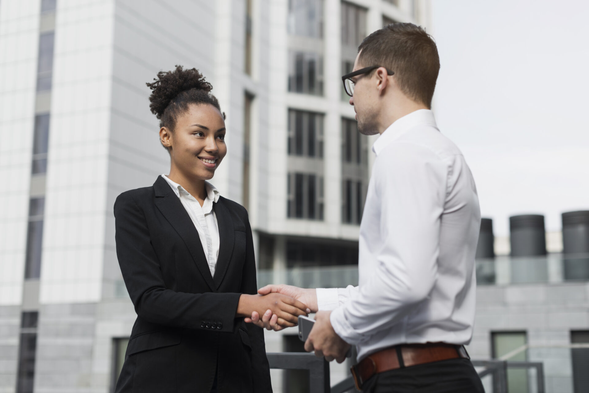 man-woman-shaking-hands